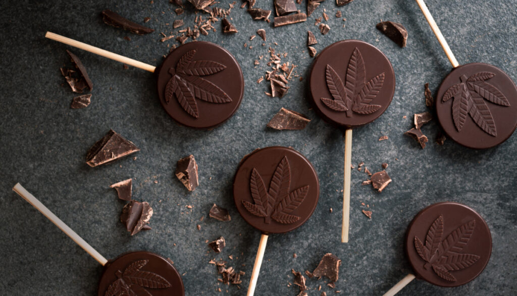 Chocolate edibles with a marijuana leaf printed on the front